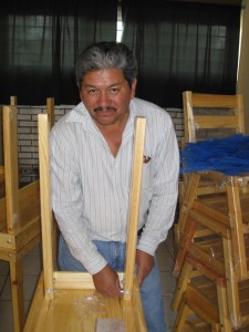 Parents build the building for the computer lab and library and many of the tables.