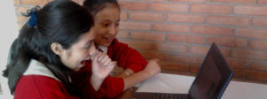 Two Girls with KoC supplied laptop at El Colegio Britanico, Mexico